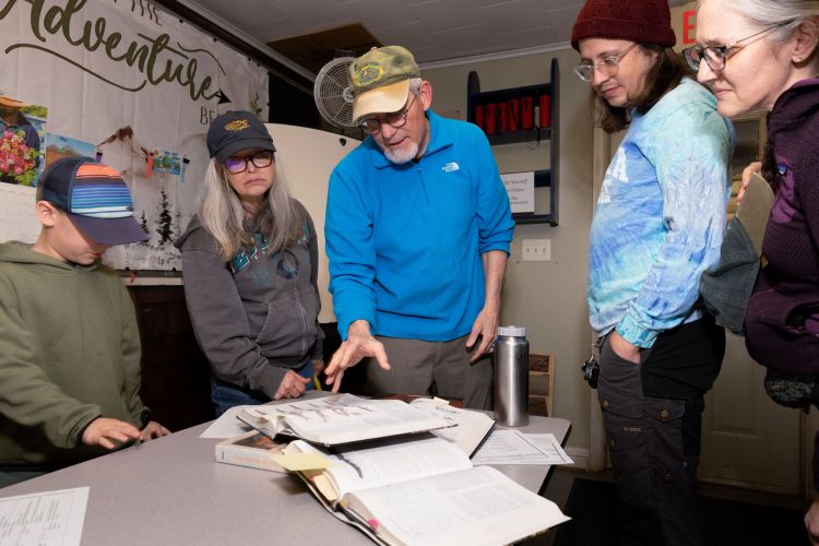 Neil Heinekamp (center) talks about salamanders. Photo by Toni Genberg.
